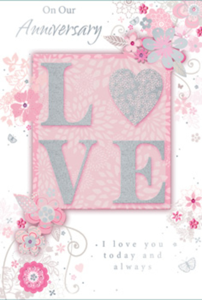 The photograph captures an anniversary card that feels as welcoming as stepping into a sun-filled sitting room in Addington where love has been quietly nurtured for years. Dominating the centre is the word LOVE, rendered in an elegant design with a frosted glitter finish that appears slightly raised from the surface. The texture looks as though it would gently catch on your fingertips, reflecting light in a soft, playful way rather than with hard sparkle. Surrounding this central word, wispy, hand-drawn blooms and airy sprays drift along the borders and edges, their shades of pink, lilac, ivory, and muted silver blending like the soft colour transitions in a carefully graded bouquet. The flowers are more stylised than botanical, with slender stems, dainty petals, and curled leaves that echo the flowing shapes of the lettering. Scattered through the design are fine flourishes and filigree lines - almost-hidden butterflies, tiny heart-like curves, and graceful loops that suggest the flutter of a quiet heartbeat before an anniversary dinner. The background is a warm, gentle blush tone, balanced by lighter ivory panels that keep the overall effect calm and luminous rather than heavy. Nestled harmoniously among the flowers is the message, I love you today and always, set in understated, graceful type. The text feels like a whispered promise, honest and unhurried, as if spoken while arranging a simple vase of anniversary flowers on a kitchen table in Addington. Every element, from the soft colour palette to the flowing flourishes, works together to make the card feel like a paper bouquet - tender, thoughtfully arranged, and meant to be kept and touched again and again.